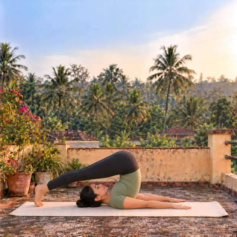 Woman demonstrating Halāsana, plough pose
